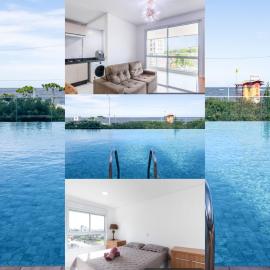 Aptos Pé na Areia Vista Mar Condomínio Resort Completo com Piscina borda Infinita, Beach Tennis, Academia, Sala de Jogos, Brinquedoteca, Playground e Portaria 24H 3 Quartos com Ar-Condicionado, Churrasqueira Privativa Reserve Agora e Viva essa Experiência, Hotel in Balneário Piçarras