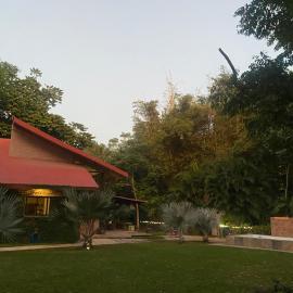 Country house with pools, gardens and river inside gated development