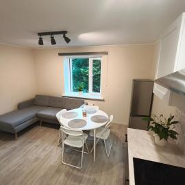 Self check in apartment in a private house near Airport with free parking, hotel a Mārupe