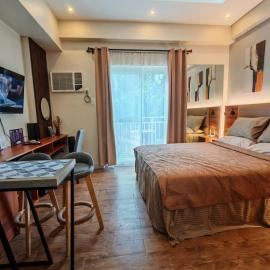 Condo Traveler's Nest 211, Amani Resorts Residences, 5 minutes Airport, Netflix, Stylish, Cozy with Luxurious Swimming Pool