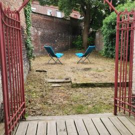 Cocon T2 avec jardin, Terrasse & Climatisation en plein centre-ville, à deux pas du métro et de la gare TGV, Hotel in Tourcoing