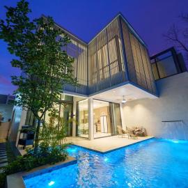 Brand new 4-bedroom villa with a high-ceiling living room, modern smart home, and private pool
