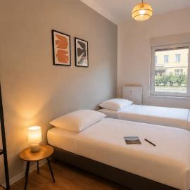 Geräumiges 4-Zimmer-Apartment - 8 Boxspringbetten, zentral, Küche, Wifi, Self Check-in