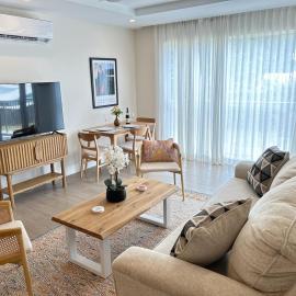 Stylish Condo Steps From Beach!