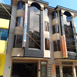 Hotel Carolina، فندق في Chaguarpamba