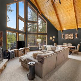 Modern Mountain Chalet with Wall-of-Windows Forest Views.