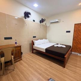 Joy Ac Hall & Rooms, отель в городе Pāmban