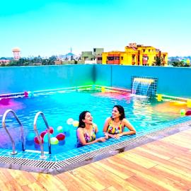 Rooftop View Coral Crestie-Near Temple#Swiming Pool #Comfortable Stay-Premium Facility with Wi-Fi And Fully Ac Room