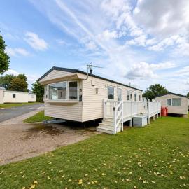 Cosy caravan at Sand le Mere Holiday Park with decking, ref 71023J