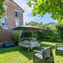 Stylish apartment & private garden - 15 min from La Défense - 25 m from central Paris