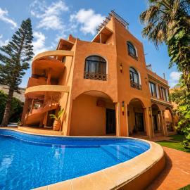 Maison Sahel - African Art & Coastal Serenity