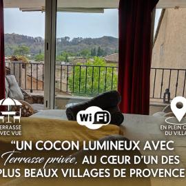 En plein cœur du village , Terrasse avec vue