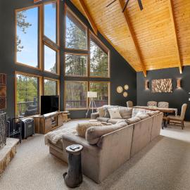 Modern Mountain Chalet with Wall-of-Windows Forest Views.