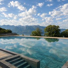 Flat with view of Lake Léman & swimming pool โรงแรมในPuidoux