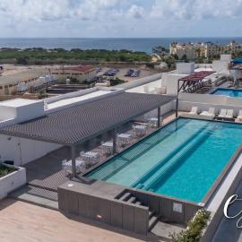 Endless Summer - Award Winning 2Bed 2Bath Condo - Heated Rooftop Pool with Ocean Views - Gym - 5min walk to Beach - Fiber Internet - Sleeps 6