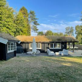 Beamed house by the water in Hornbaek