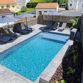 Centrally located 2 bedrooms house with shared heated pool