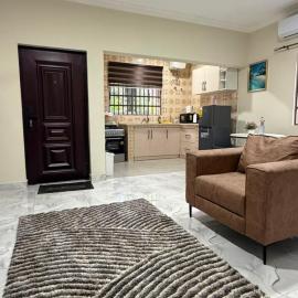 Coconut Gardens Apartments, מלון בOgbojo