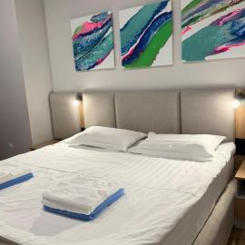 Raduga West Apart Hotel 305, hotel u gradu Koshkolʼ