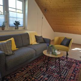 Apartment am Golfplatz, Baustert
