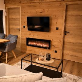 Forest Lodge I Kromlau mit Elektrokamin und Terrasse, khách sạn ở Kromlau