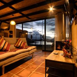 Cabin overlooking the Huaypo Lagoon in the Sacred Valley, Cusco