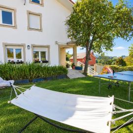 Casa en la playa, con jardín, jacuzzi y barbacoa