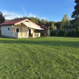 Wczasy Pod Sosnami domek z kominkiem, hotel a Krutyń