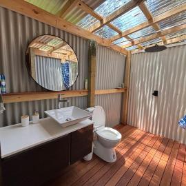 Rainforest glamping by the beach