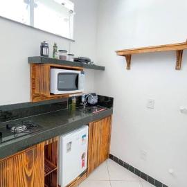 Kitnet linda aconchegante centro de Caratinga 3A, hôtel à Caratinga