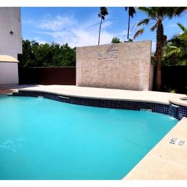 Designer Condo w/ Top Amenities Gated + Pool