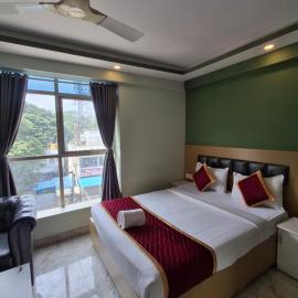 Hotel Cozzy Inn, хотел в Бангалор