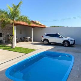Duplex de 2 quartos com ar condicionado , piscina e estacionamento