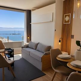 Vista al mar y gimnasio - Estudio convertible para tres personas