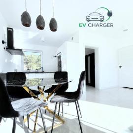 Apartamenty Pod Lasem Szczecin-Pilchowo EV Stacja ładowania: Pilchowo şehrinde bir otel
