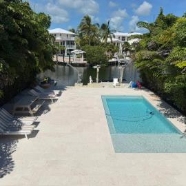 Waterfront 4BR,4BA Home - Private Pool and Beach - Golf Cart - Dock - Sleeps 9