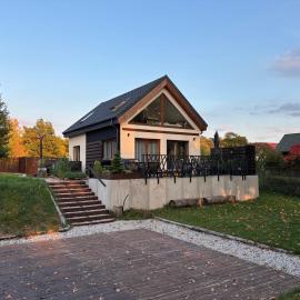 Dom nad jeziorem z banią i tarasem, hotel Drzewoszewo városában