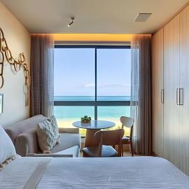 Flat Elegante com Vista Panorâmica para o Mar