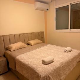 Appartement a coté de aswaq assalam, hotel Udzsdában