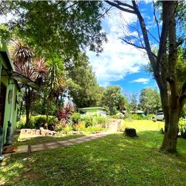 Cozy private Ferngrove cottage with garden views at Stormsriver