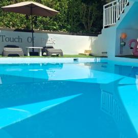 A Touch of Pink - Secret Tropical Retreat with Pool & Mountain Views - Underground River, Fireflies & Waterfalls, hotel sa Puerto Princesa