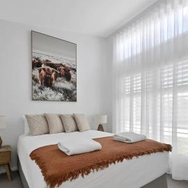 The Elm Apartments - The Cowhide Room