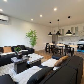 Bright 3BR Upper Duplex with Patio and Free Parking