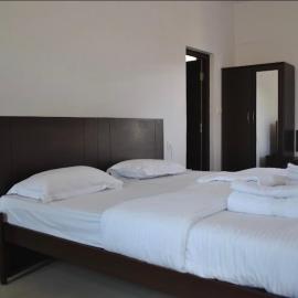 Hotel Dasawal، فندق في ماديكيري