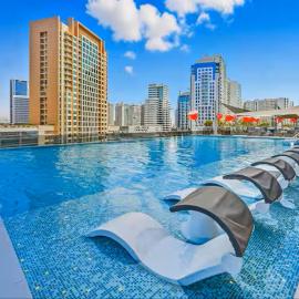 Vogue Vacation Homes, Downtown Mag 318 near Burj Khalifa and Dubai Mall, Studio Apartment with Balcony, Canal and City View, Access to all Amenities