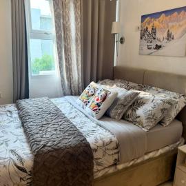 Snuggle's Nest Tanza Condo