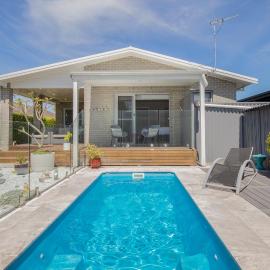 Saltwater Bliss - Sunlit Poolside Haven by the Sea