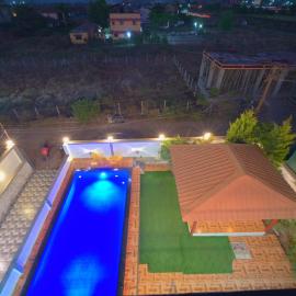MYSTICAL STONE VILLA Il 4BHK II AC II POOL II BY EMPYREAN STAY
