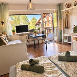 Ferienwohnung Darosa Bergblick、ゼークのホテル