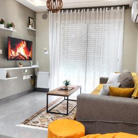 Appartement Cosy calme et climatisé avec WIFI Rapide, hotel in Boumhel El Bassatine